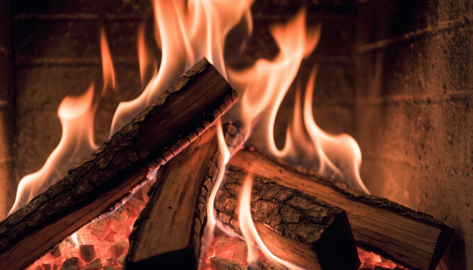Kindling and a lit wood fire